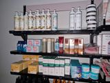 many different types of products on the shelves in the room