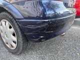 a close up of a car that has a dent in it