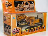 a box with a toy truck in it on a white surface