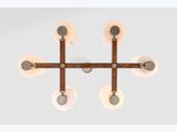 a close up of a light fixture on a wall