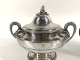 pair of antique silverplated teapots with handles and lids
