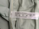 a close up of a label on the back of a jacket