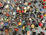 a lot of buttons that are on a table