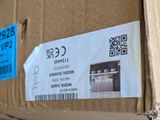 a cardboard box with a label on it and a barcode on it