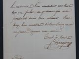 une vieille lettre manuscrite sur une feuille de papier où figure le portrait d'un homme