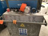 an image of a machine that is sitting in a warehouse