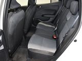 a white car with black seats in the back of it