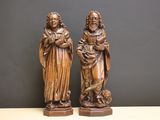 paire de figurines anciennes en bois sculpté représentant deux femmes