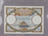 l'image d'un billet de banque sur lequel figure le portrait d'une femme