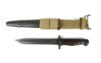 two different types of knives are shown on a white surface