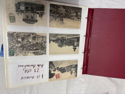 a red book with pictures of a train on it