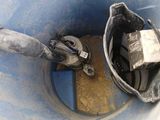 a blue bucket with a metal handle and a metal latch