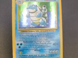 a close up of a pokemon card on a table