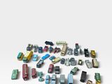 a lot of toy cars that are on a white surface