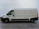 a white van that is parked in a parking lot
