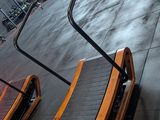 two pedals that are sitting on the floor in the gym