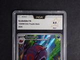 a close up of a pokemon trading card on a table