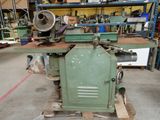 a machine that is sitting on a pallet in a warehouse