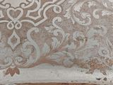 a silver tray with a floral design on it