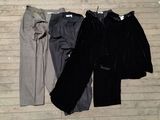 three pieces of clothing that are laying on the floor