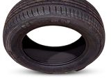 a close up of a tire on a white background