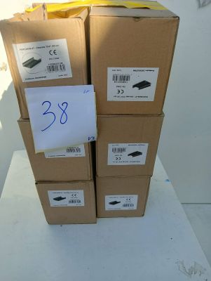 three boxes of electronic devices stacked on top of each other