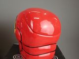 a red helmet sitting on top of a box