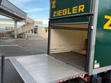 a truck that is sitting in the parking lot