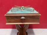a wooden table with a chess board on top of it