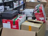 many boxes that are sitting on the floor in the warehouse