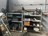 a room with a bunch of items on the shelves