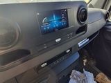 a car dashboard with a tray of food in it