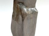 a stone sculpture that looks like it is sitting on a table