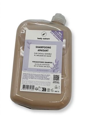 the bottle of shampooing is in a clear plastic container