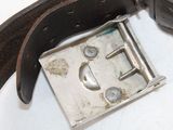 a metal buckle that has a metal buckle on it