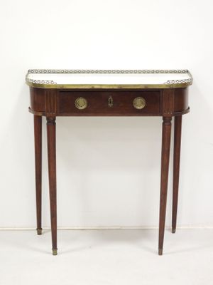 an image of a small table with two drawers and a tray on top