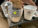 a man that is standing next to a table with a bowl and a cup