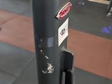 a bike that is parked in a gym area