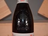 a bottle of wine that is sitting on a table