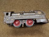 a toy train that is sitting on the ground