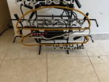 a bike rack that has a bunch of bikes on it