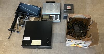 a lot of electronics that are sitting on the floor