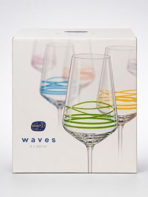 three wine glasses in a box on a white background