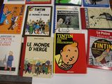 many children ' s books that are on the table