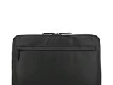 a black laptop case sitting on top of a white surface