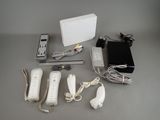 a lot of electronic items that are sitting on a table