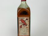a bottle of liquor that is sitting on a table