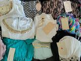 many different types of clothing on display in a store