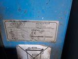 a picture of a blue box with a sign on it
