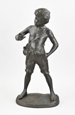 bronze statue of a boy with a glove on his hand